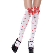 Op deze afbeelding zie je een Accessoires, van het merk Smiffy's. Ondoorzichtige Witte Dijhoge Kousen Met Strik Vrouw