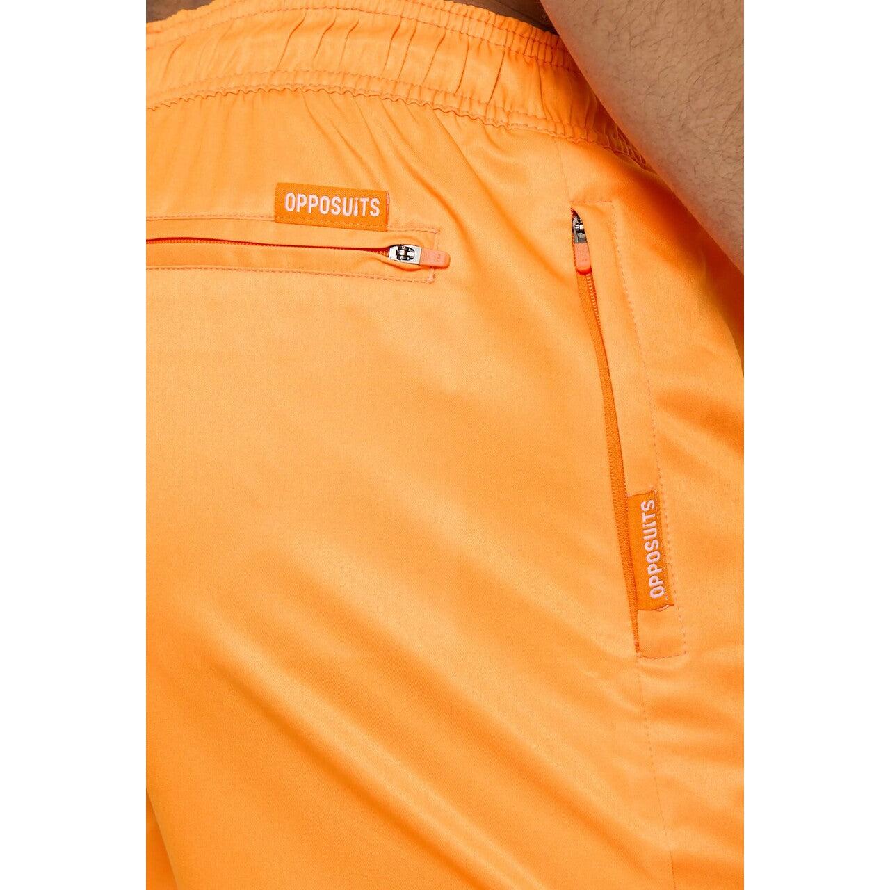 Op deze afbeelding zie je een Kostuums, van het merk Opposuits. Neon Vivid Orange Beachwear Man