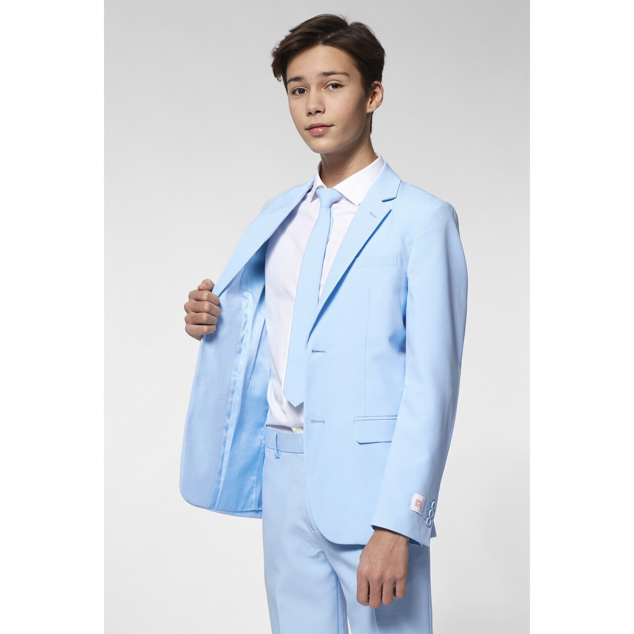 Op deze afbeelding zie je een Kostuums, van het merk Opposuits. Wauw Lichtblauw Past Bij Jou Jongen Kostuum