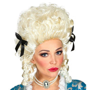 Op deze afbeelding zie je een Accessoires, van het merk Widmann. Pruik Koloniale Vrouw Ivoor
